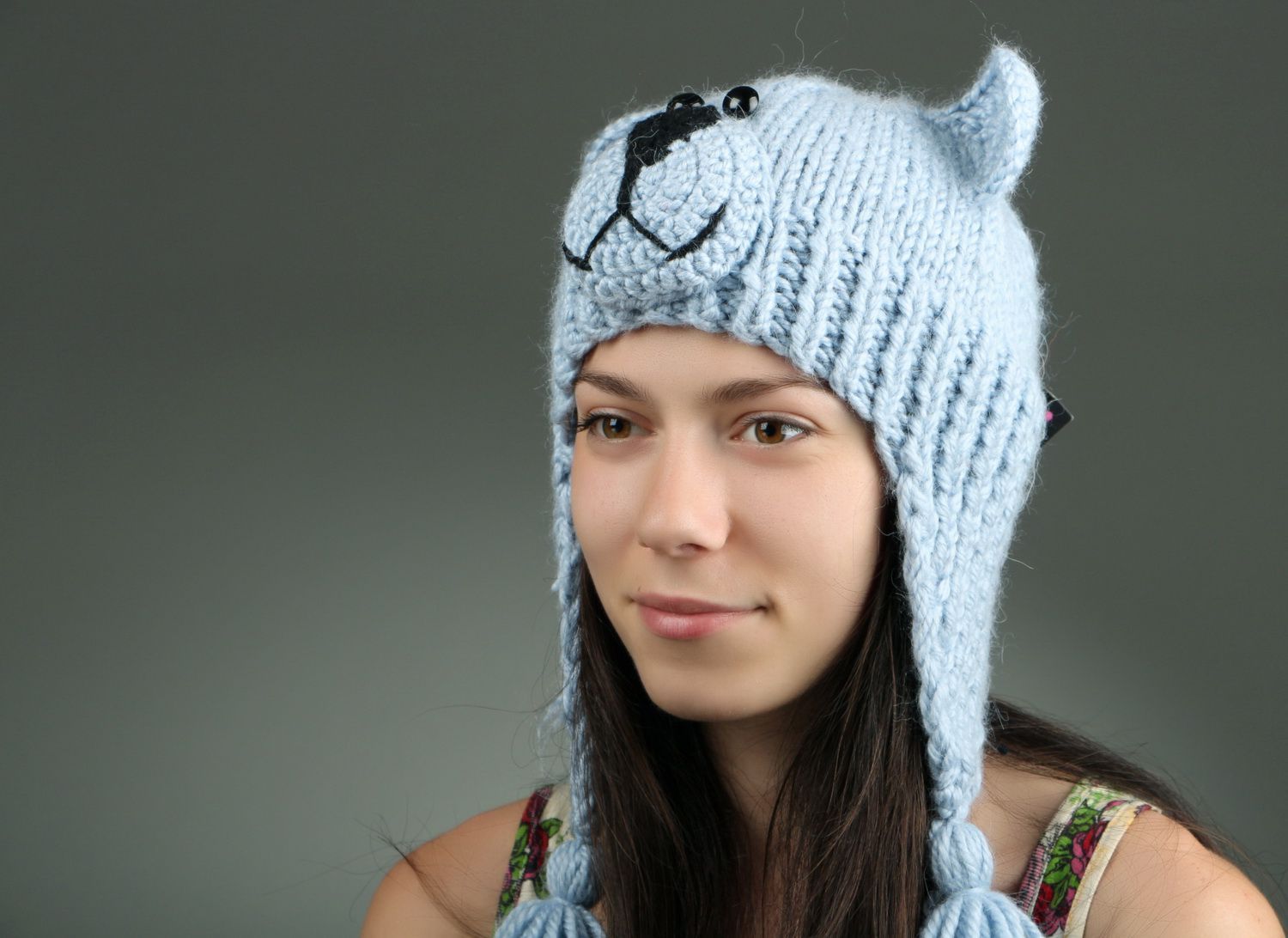 Knitted earflap hat made of semi-wool photo 5
