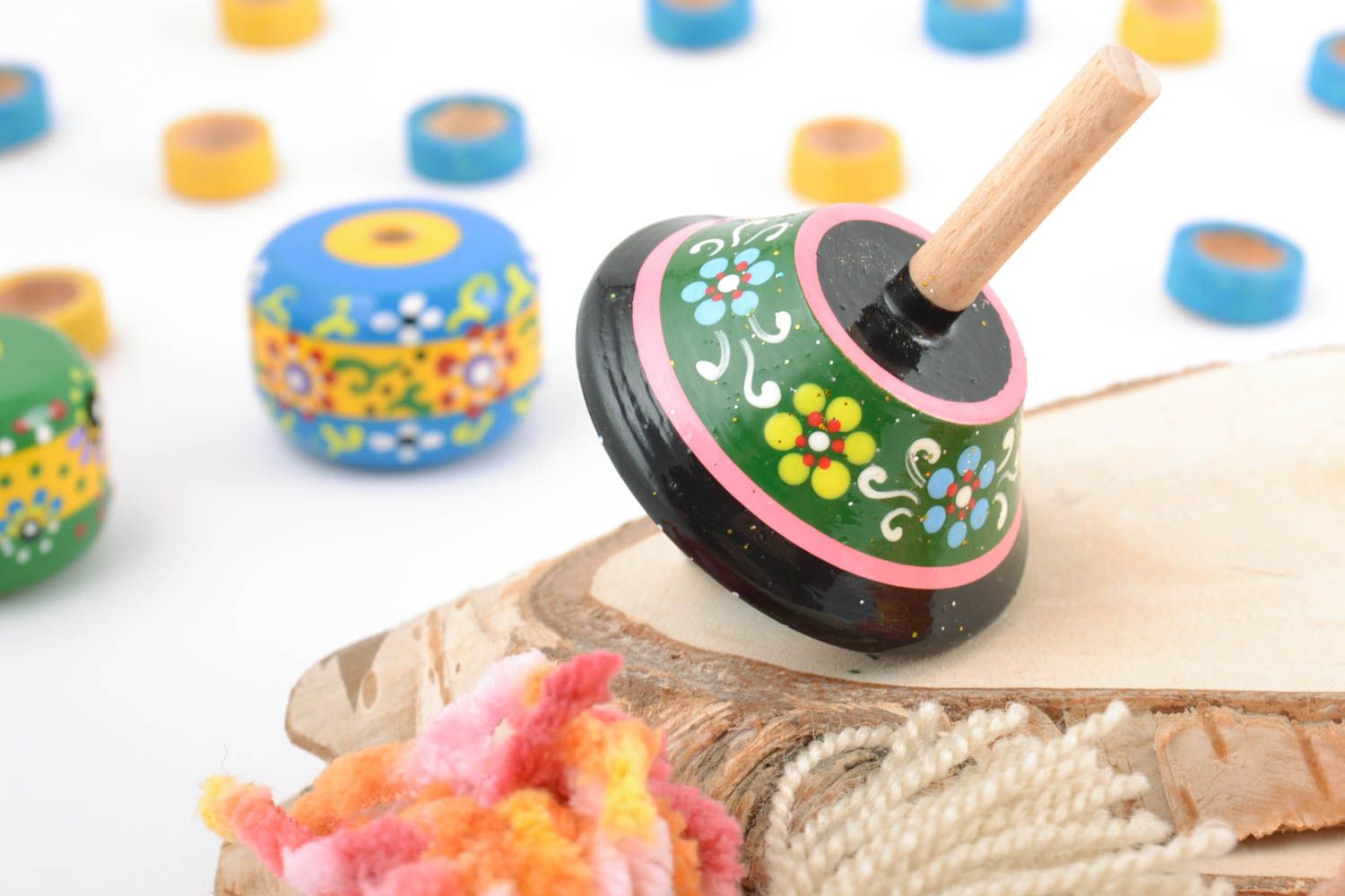 Unusual bright handmade wooden toy spinning top with eco painting photo 1