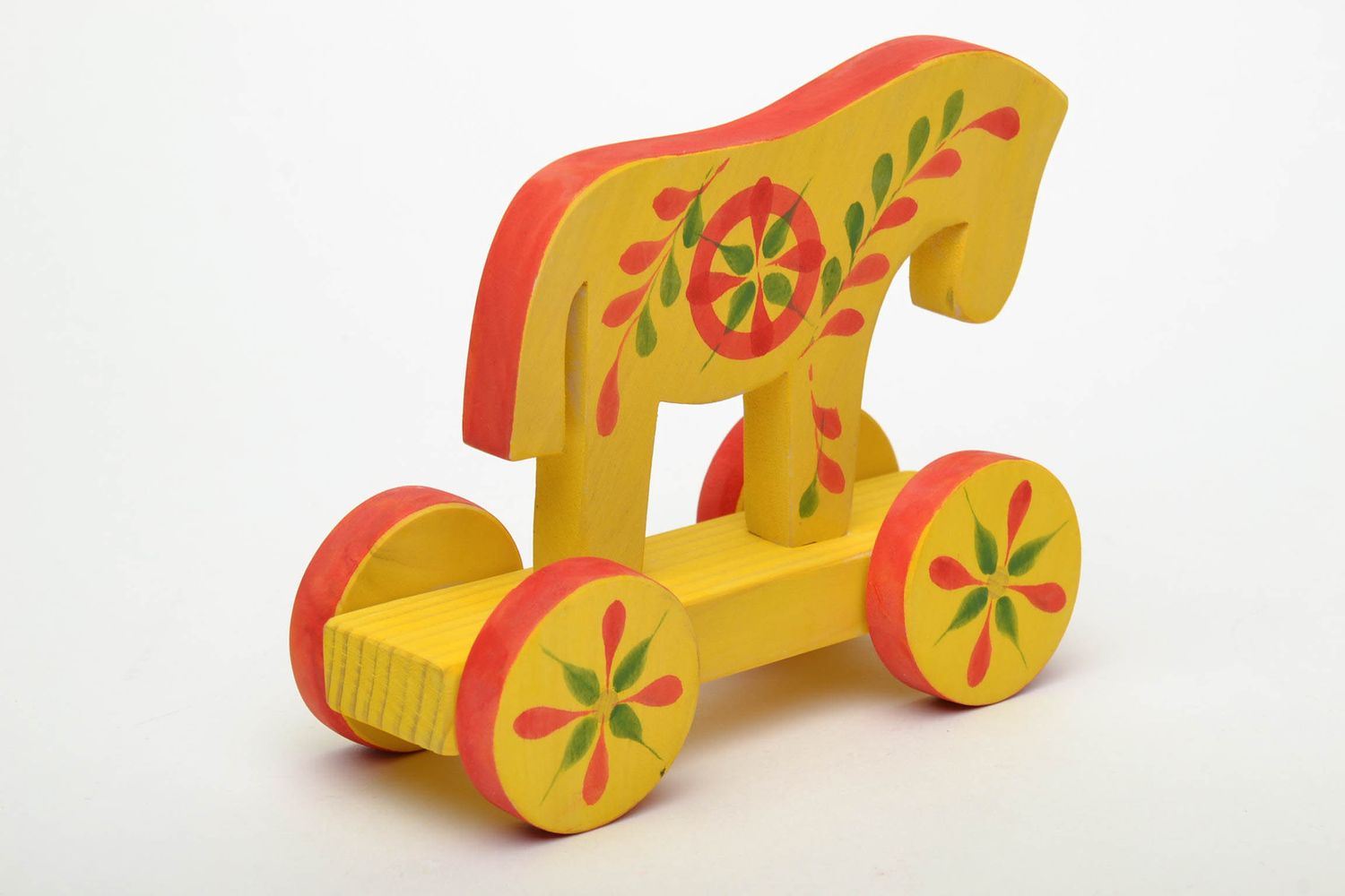 Wooden toy with wheels with ethnic painting Horse photo 3