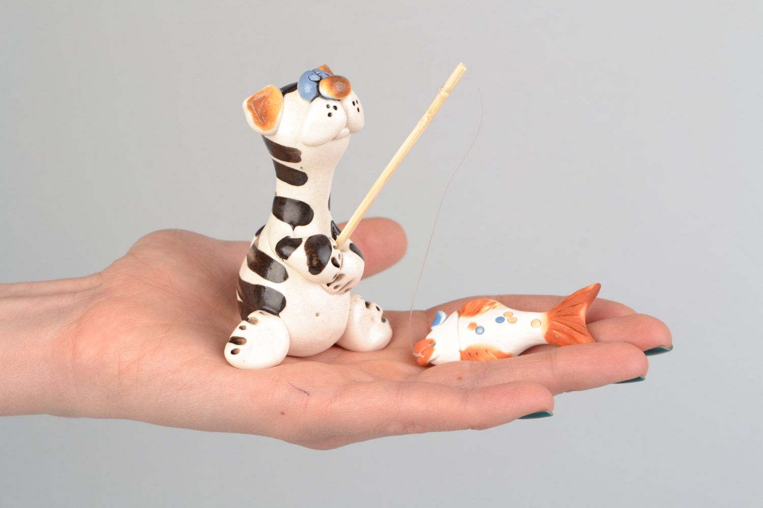 Handmade designer ceramic figurine painted with colorful glaze Cat Fisherman photo 2