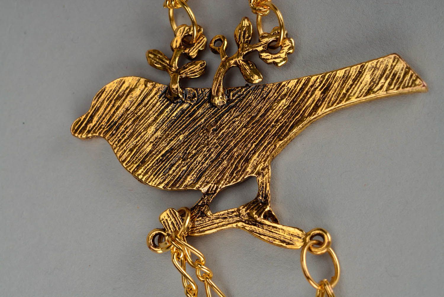 Halskette mit Vogel foto 3