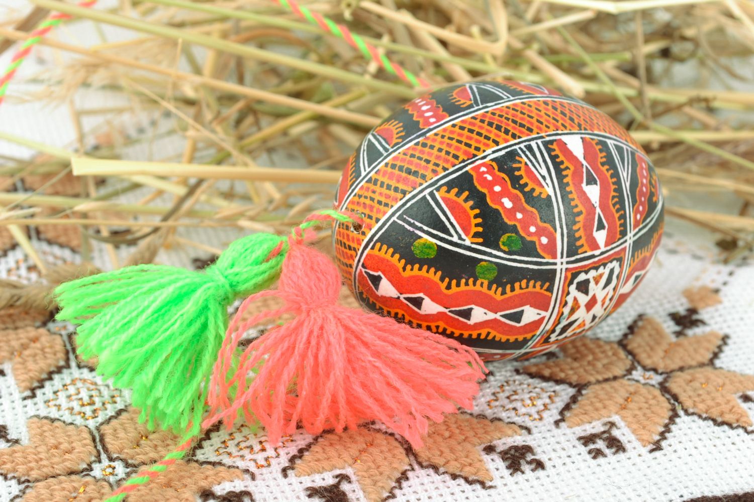 Bright Easter egg with contrast ornament equipped with cord and tassels  photo 1