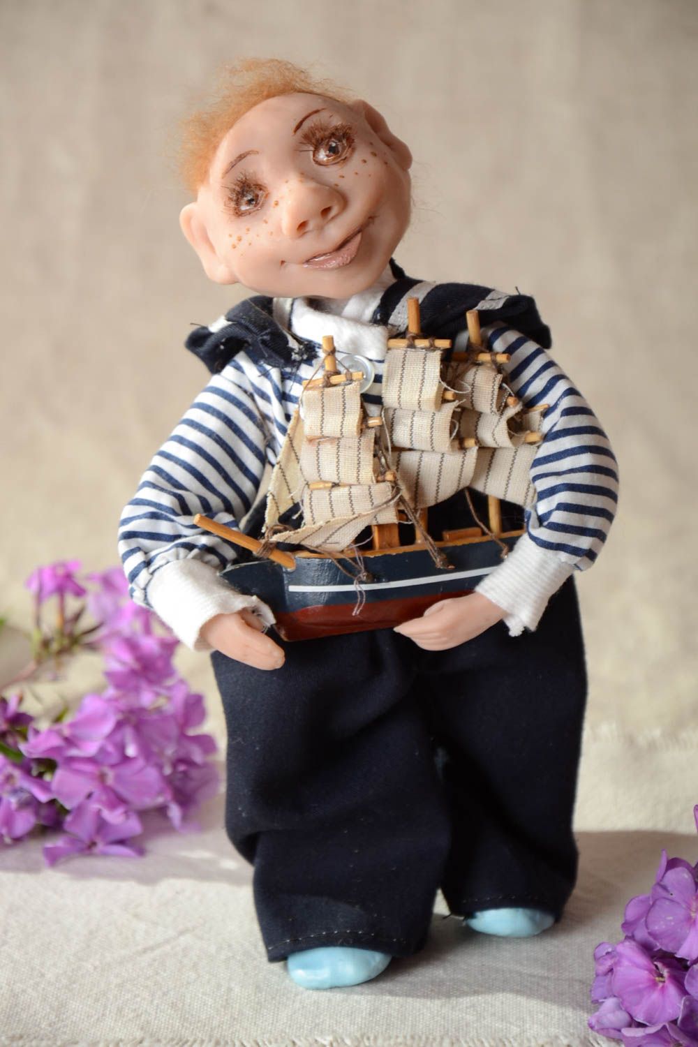 Авторская скульптурная кукла Мальчик в тельняшке с кораблем для декора хенд мейд фото 1