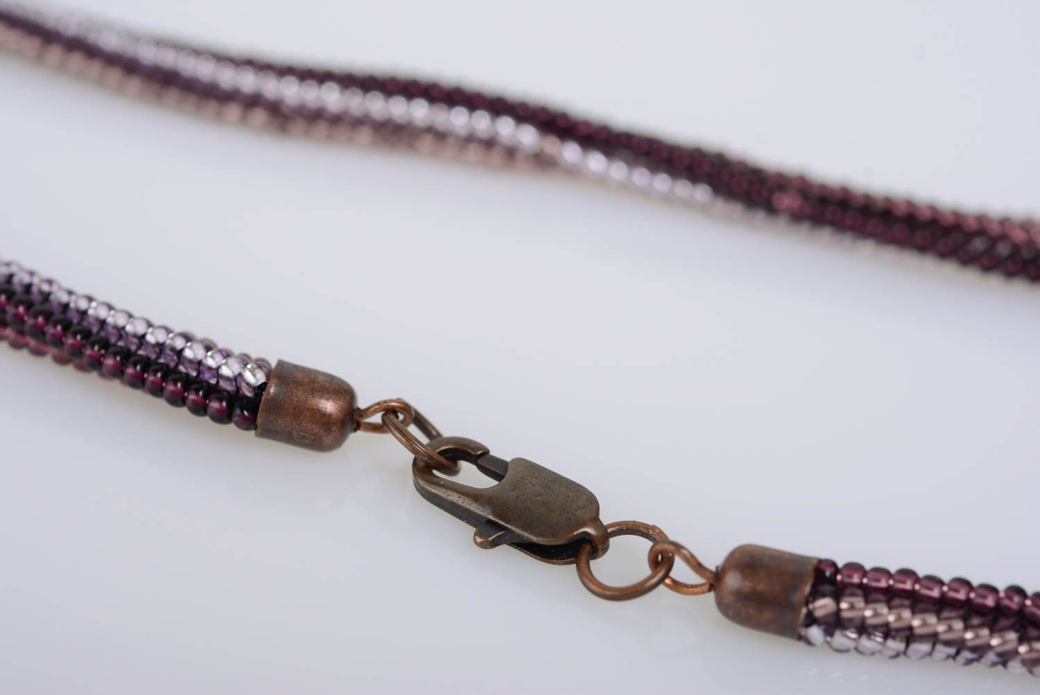 Handmade designer beaded pendant with natural seashell in violet color palette photo 5