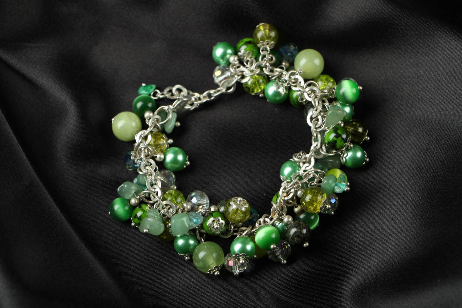 Green bracelet with natural stones photo 1