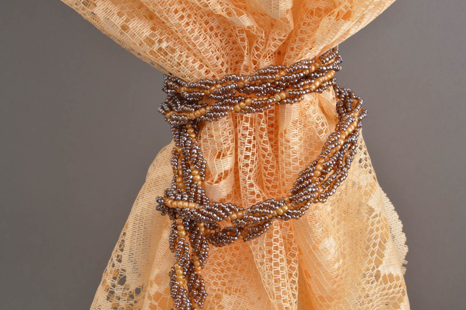 Handmade unusual delicate stylish tiebacks made of beads in bronze color photo 2