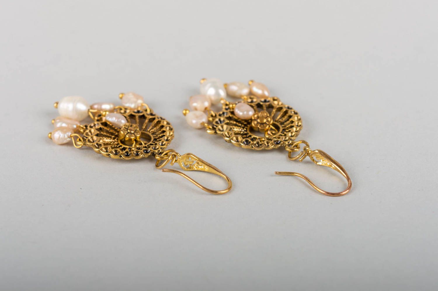Beautiful designer elegant tender handmade earrings made of pearls and brass photo 4
