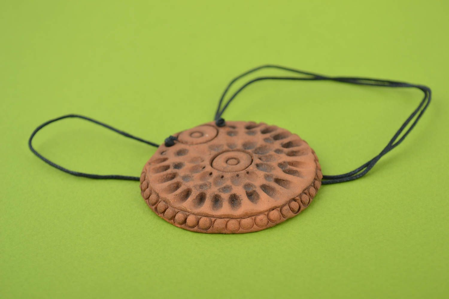 Handmade designer unusual ethnic clay pendant of round shape  photo 1
