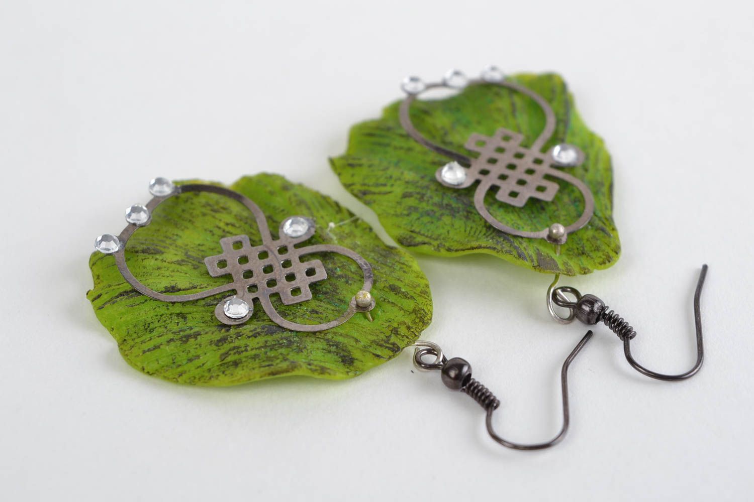 Handmade green plastic dangle earrings in the shape of leaves photo 1