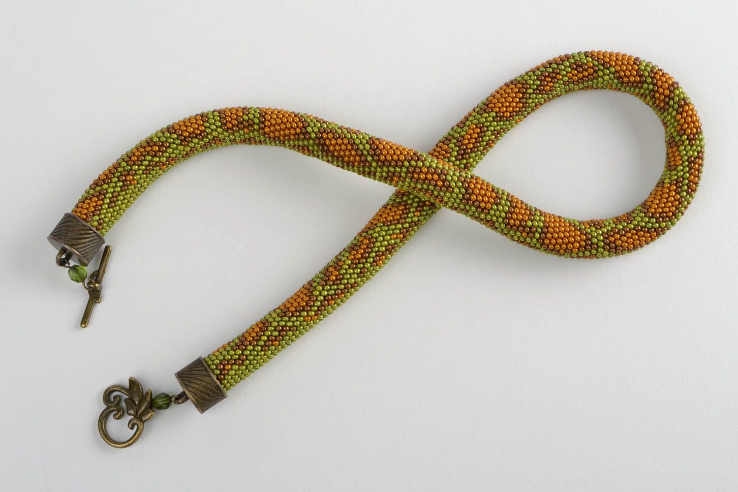 Collier en perles de rocaille tchèques au crochet vert motif serpent fait main photo 2