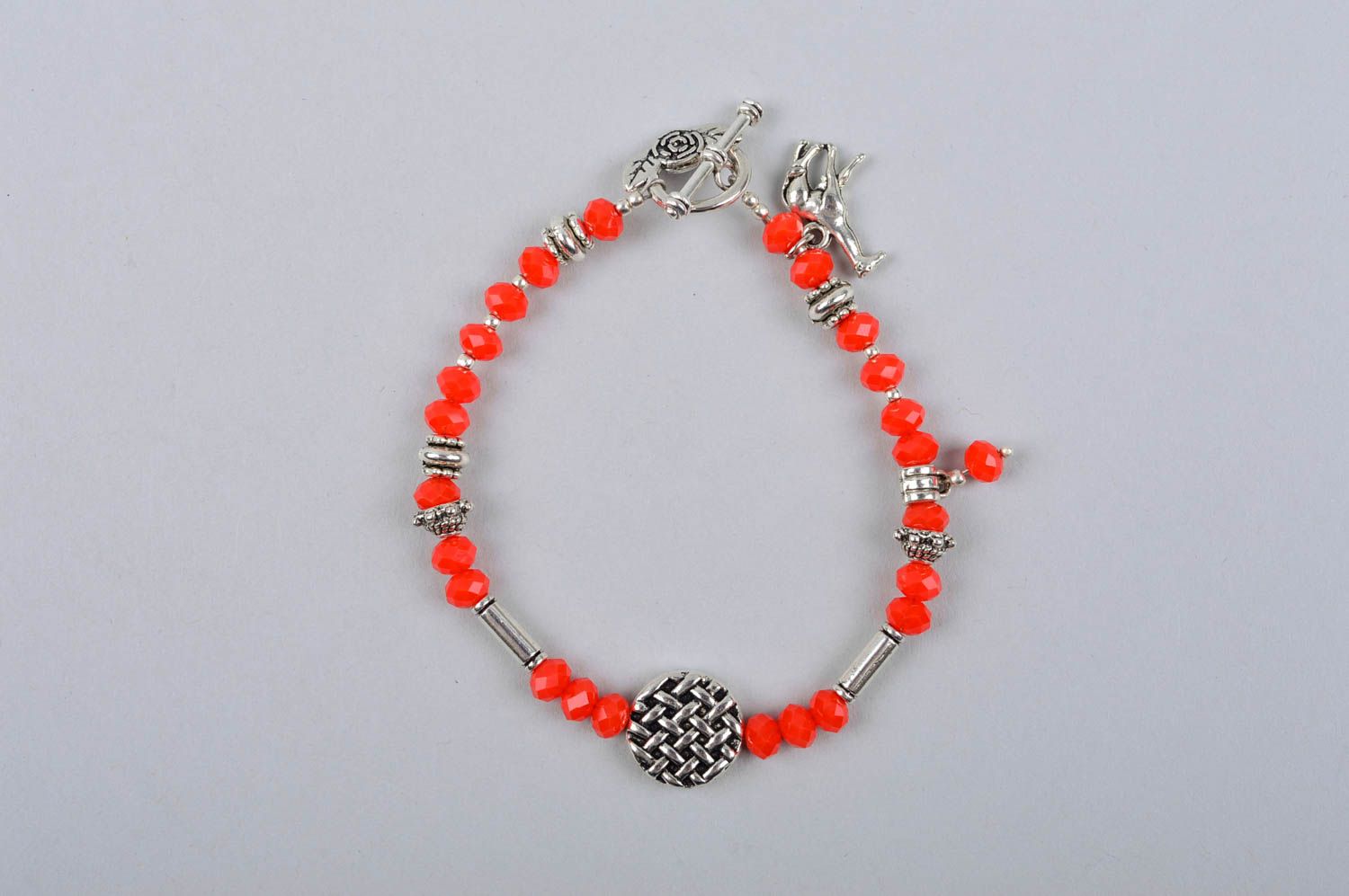 Handmade red beads bracelet with metal giraffe charm photo 2
