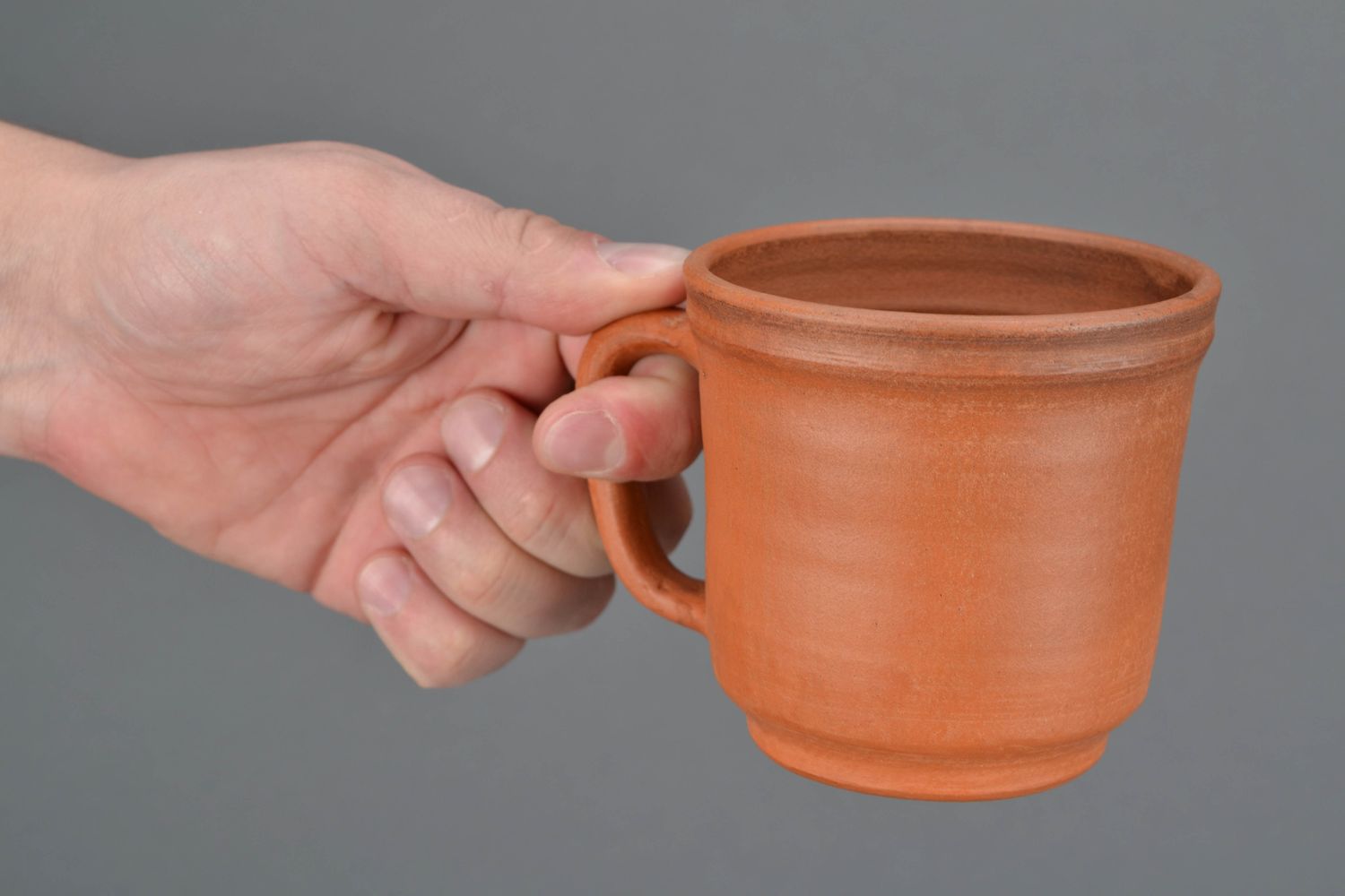 10 oz classic style clay Mexican coffee cup in terracotta color with handle and no pattern photo 2