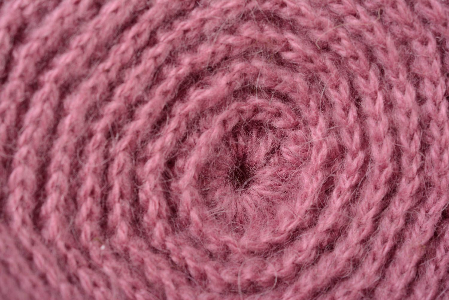 Handmade warm women's hat knitted of woolen threads of dark pink color photo 4