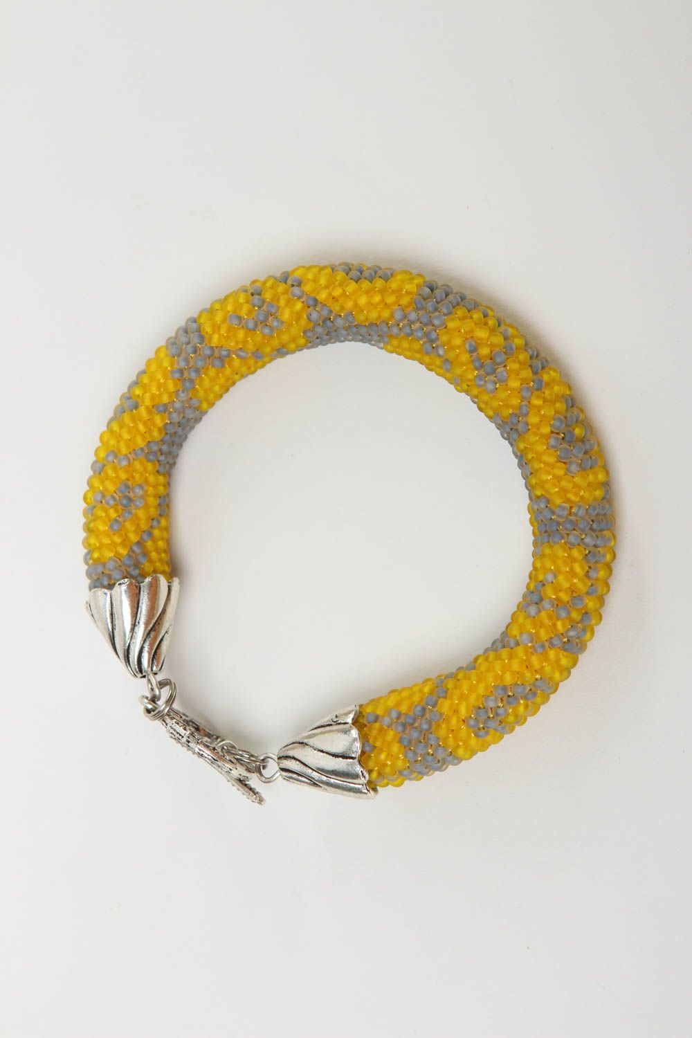 Gray and yellow color handmade beaded cord bracelet with metal fittings photo 2