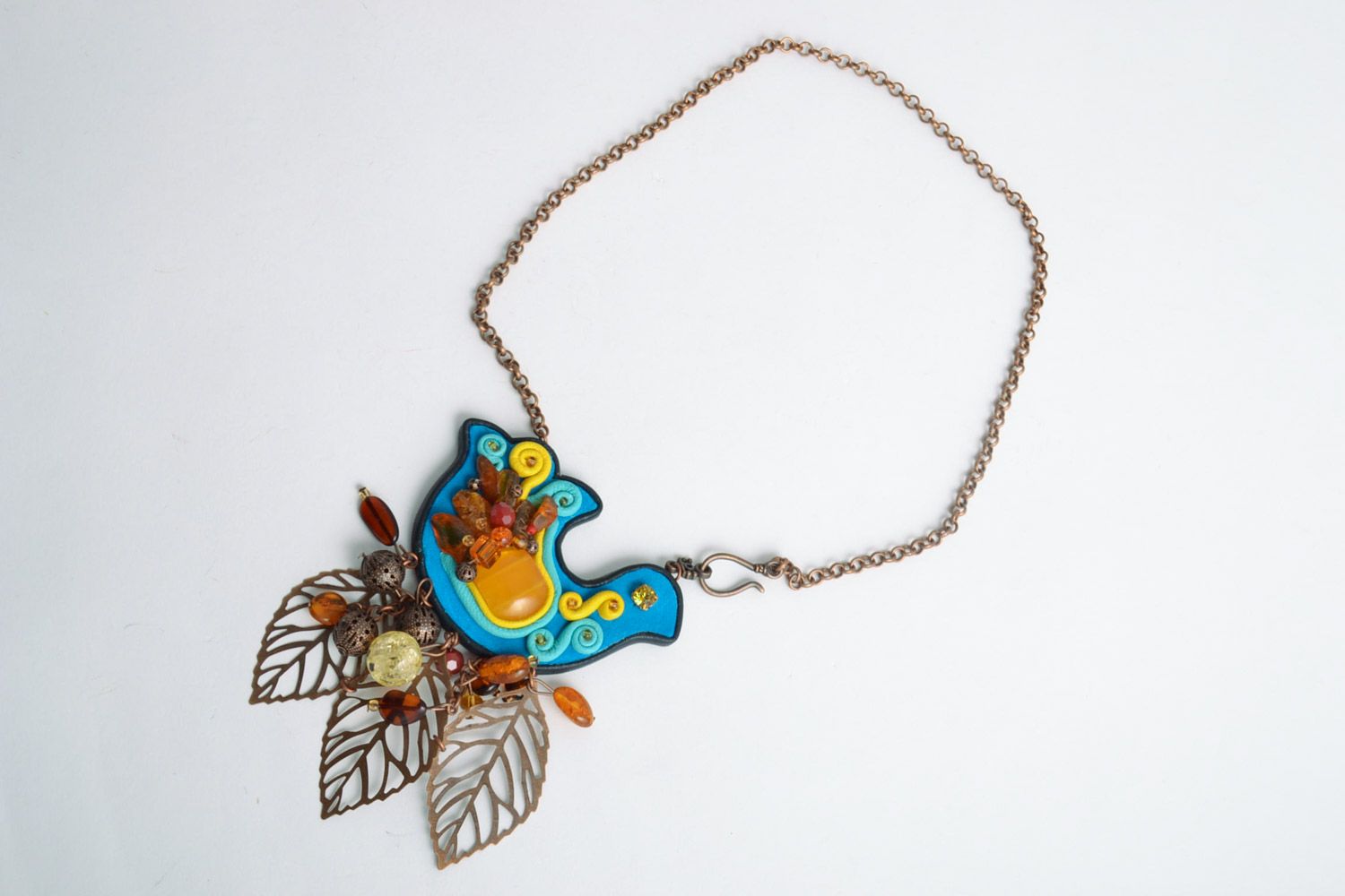 Handmade colorful necklace made of leather with natural gems in the form of a bird  photo 2