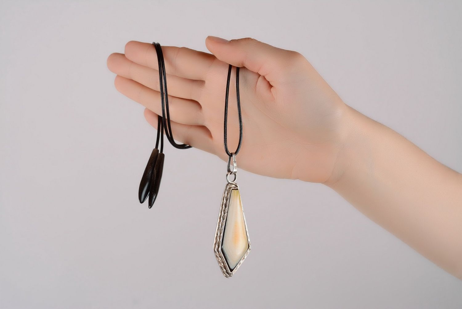 Pendant made of a cow horn photo 3