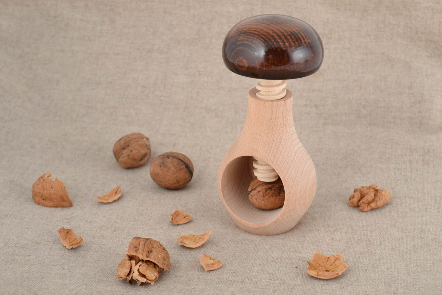 Handmade varnished carved eco wooden screw nutcracker mushroom with dark hat photo 1