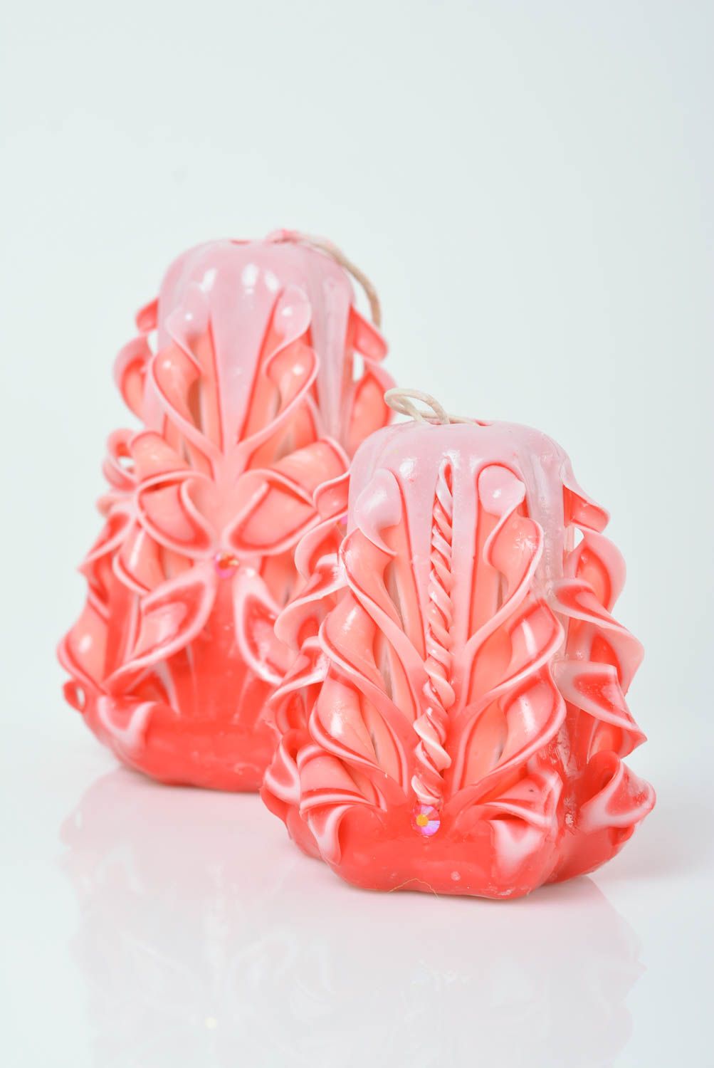 Set of 2 beautiful handmade designer carved paraffin candles of peach color photo 1