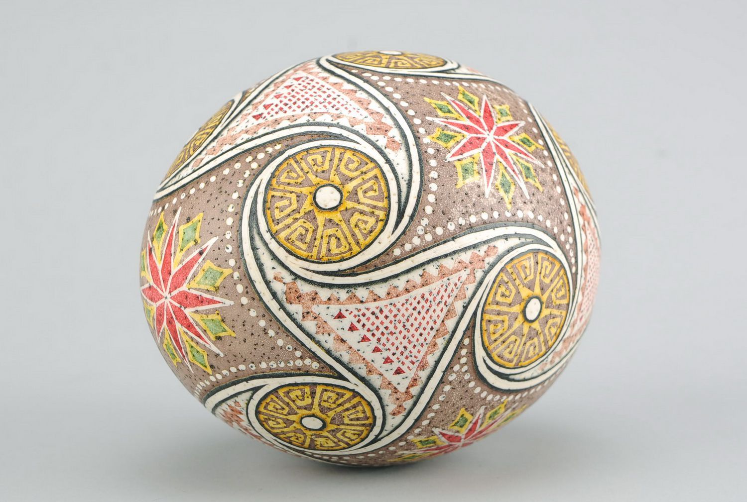 Easter egg painted with hot wax Suastica with triquetrums photo 2