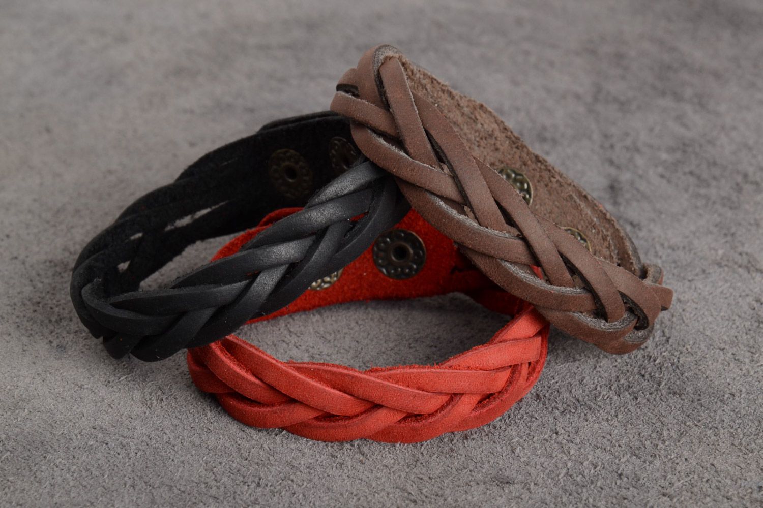 Set of three handmade wrist bracelets woven of red black and brown leather  photo 1