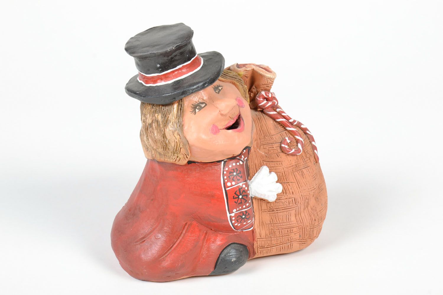 Ceramic money box in the shape of a man with a bag photo 2