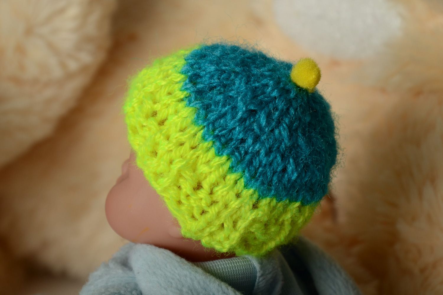 Knitted light green hat for a baby toy. Two inches in diameter photo 1
