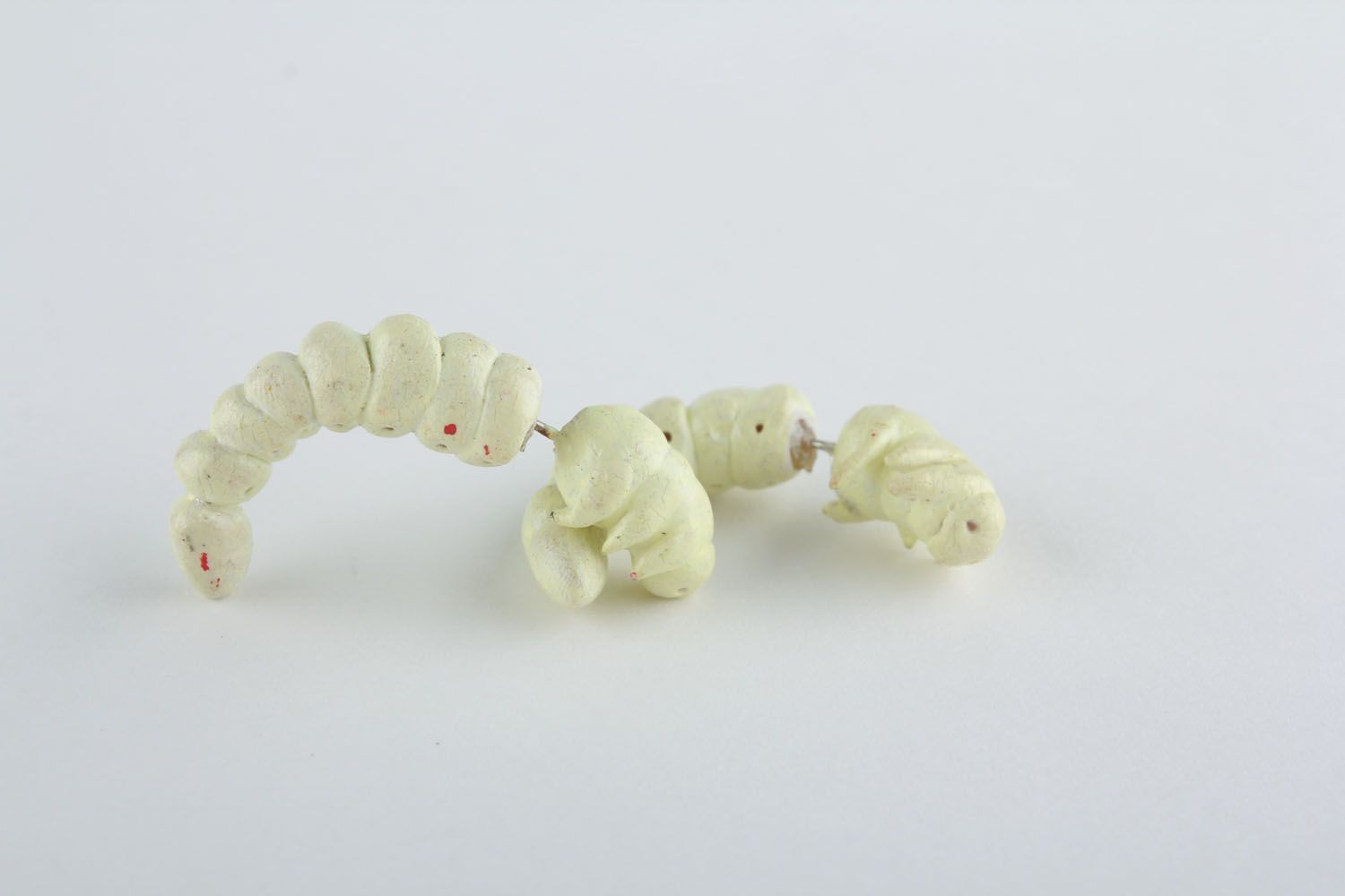 Fake ear plugs Caterpillar photo 3