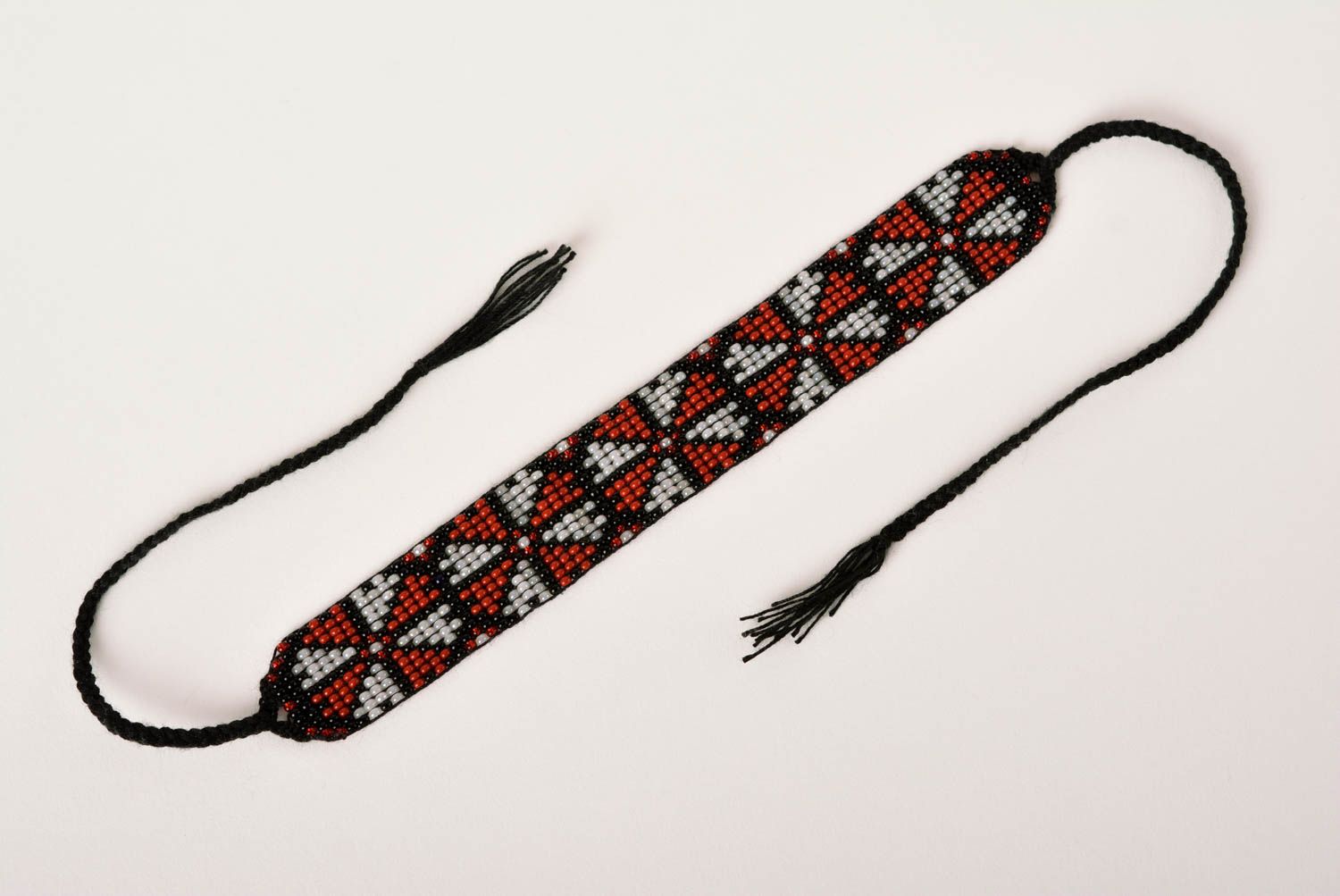 Black cord strand bracelet with geometric ornament for girls photo 4