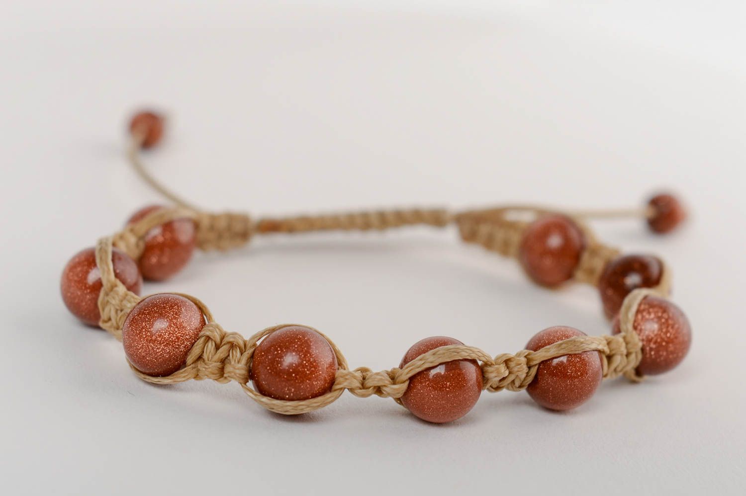 Beautiful handmade designer brown macrame woven bracelet with natural stone photo 4