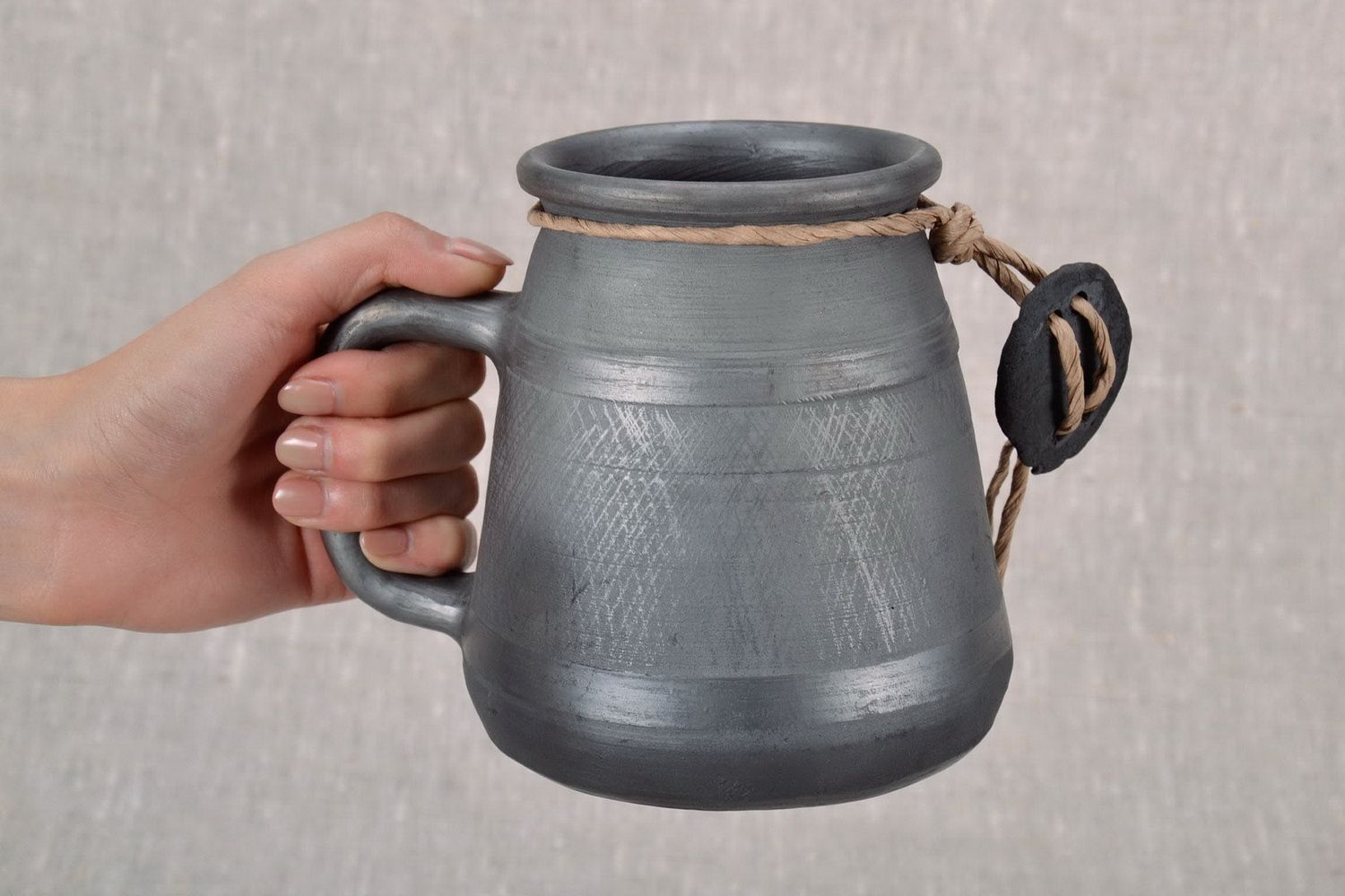 Large black smoked ceramic mug with handle photo 5