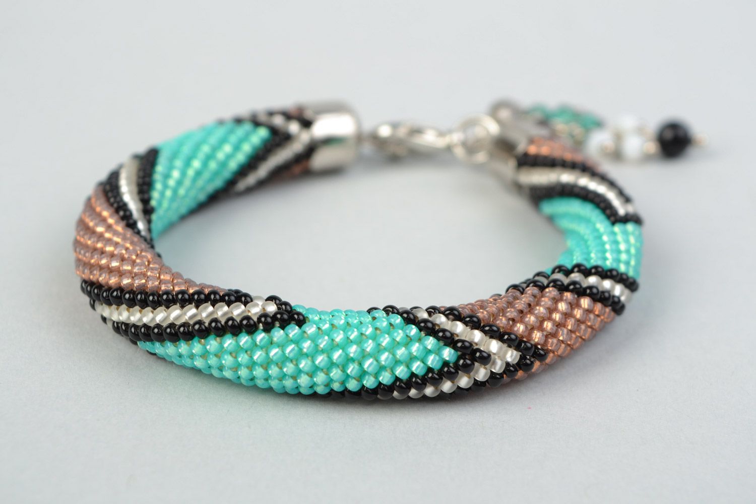 Stylish handmade beaded cord wrist bracelet with laconic two-colored ornament photo 3