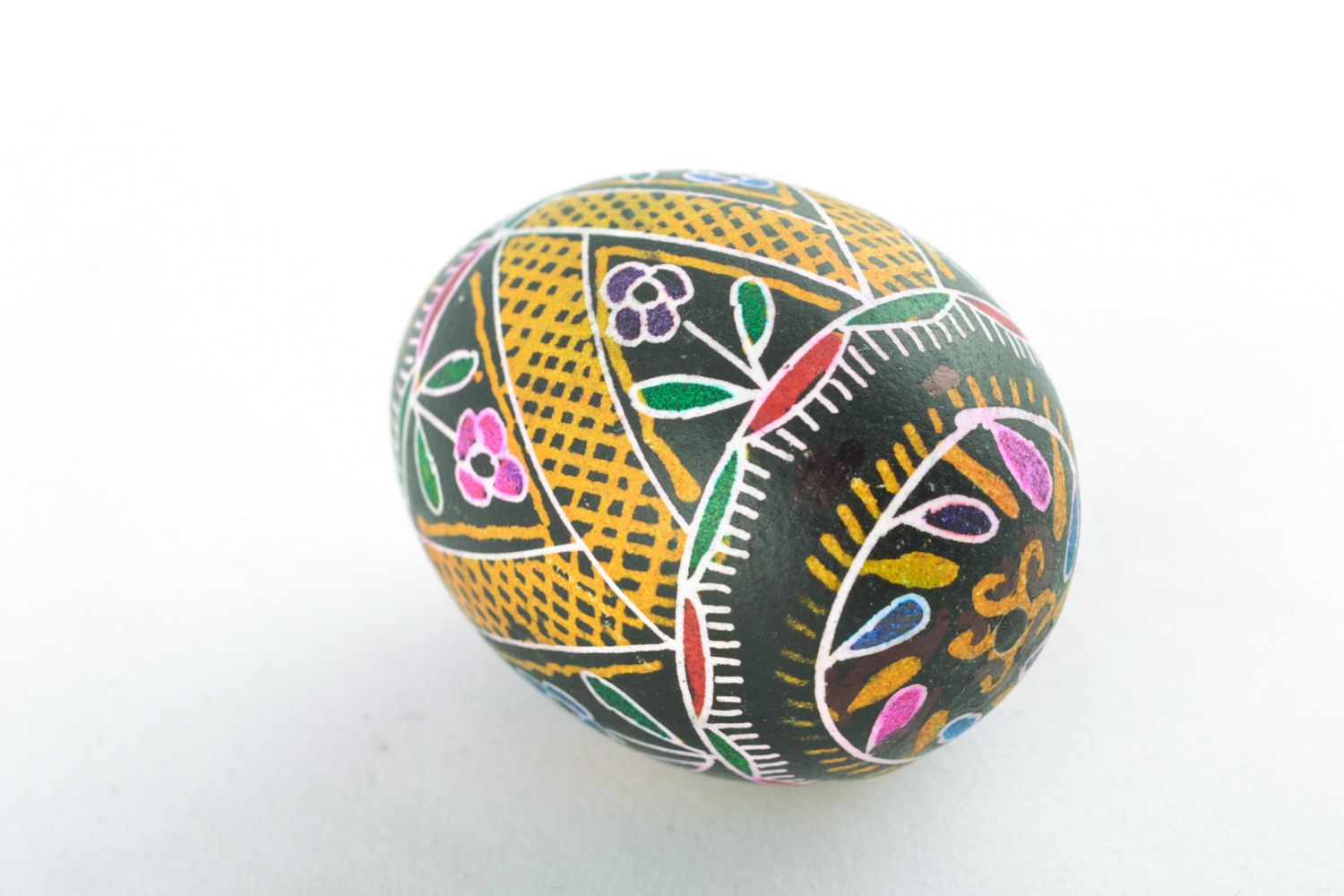 Handmade Easter egg with floral ornament painted with hot wax and aniline dyes photo 3