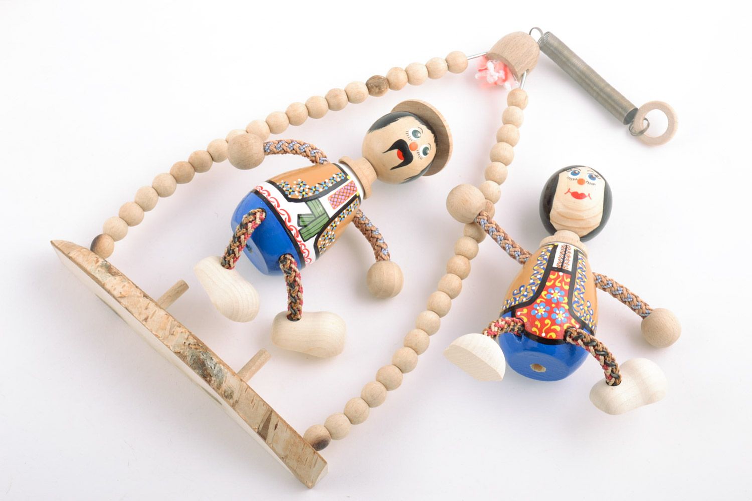 Handmade designer decorative wooden painted doll on a swing bench eco toys for kids photo 5