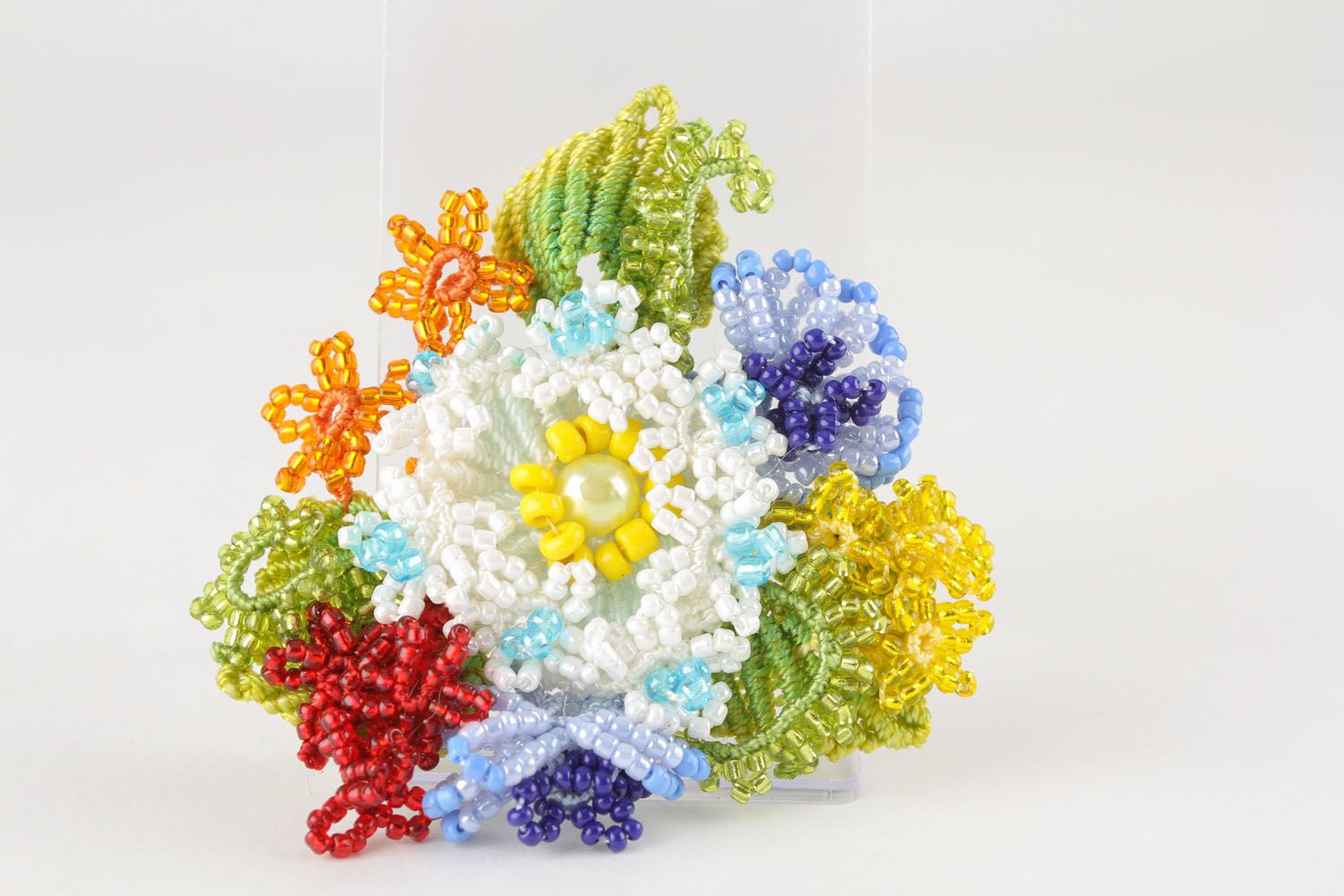 Brooch made of threads and beads  photo 2