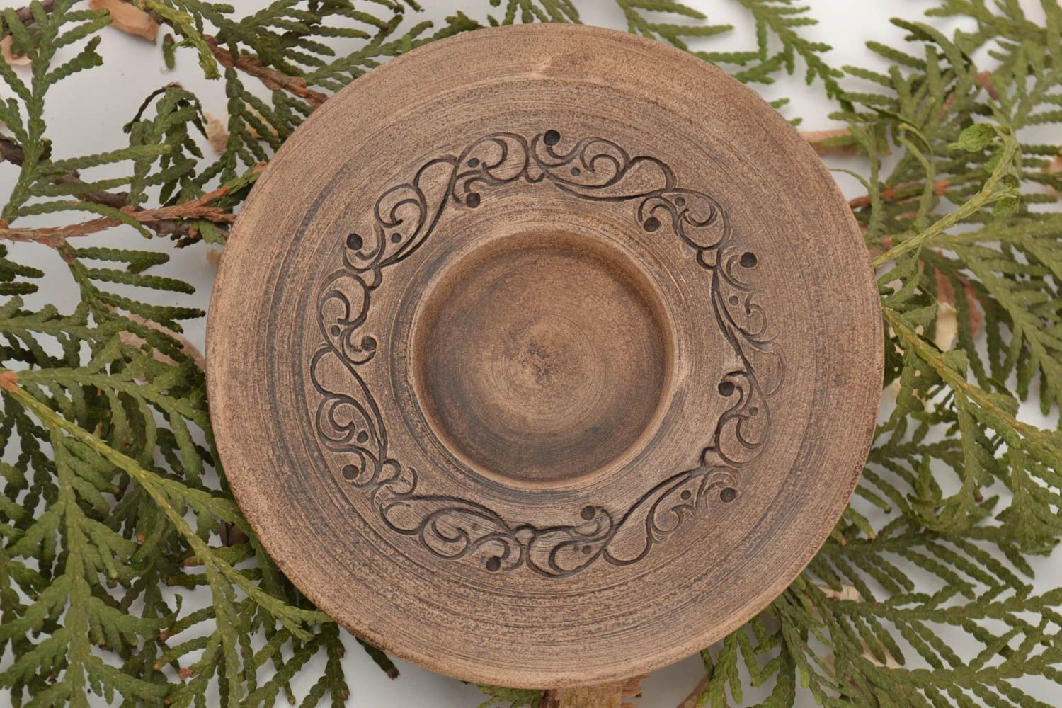 Handmade small ceramic plate made of white clay with ornament pottery photo 1