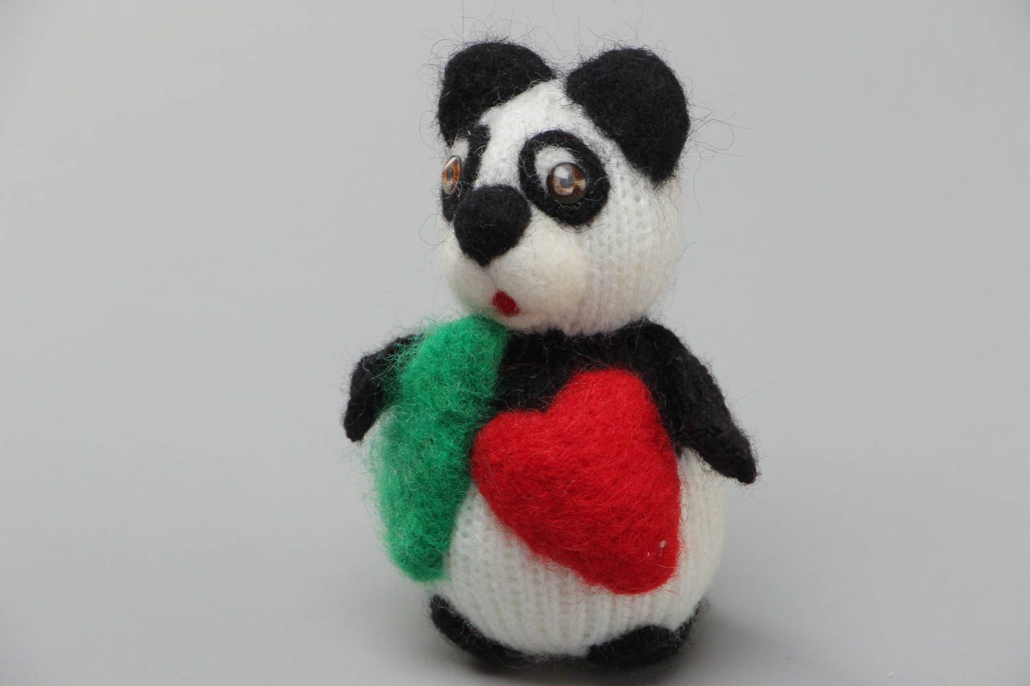 Handmade soft toy crocheted of acrylic  threads in the shape of funny panda bear photo 2