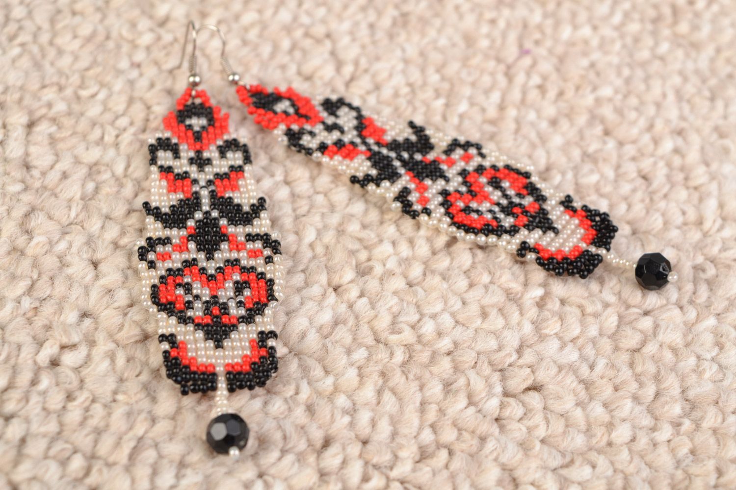 Handmade long dangling beaded earrings with ethnic motives black white and red photo 1