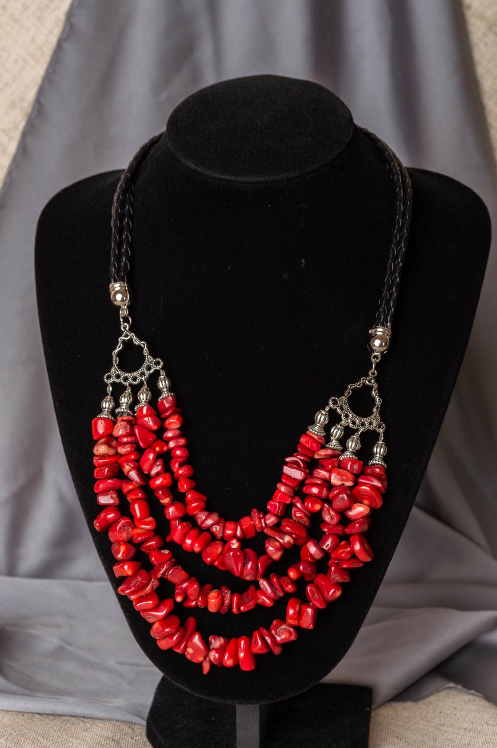 Beautiful bright red handmade necklace with natural stones on woven leather cord photo 1