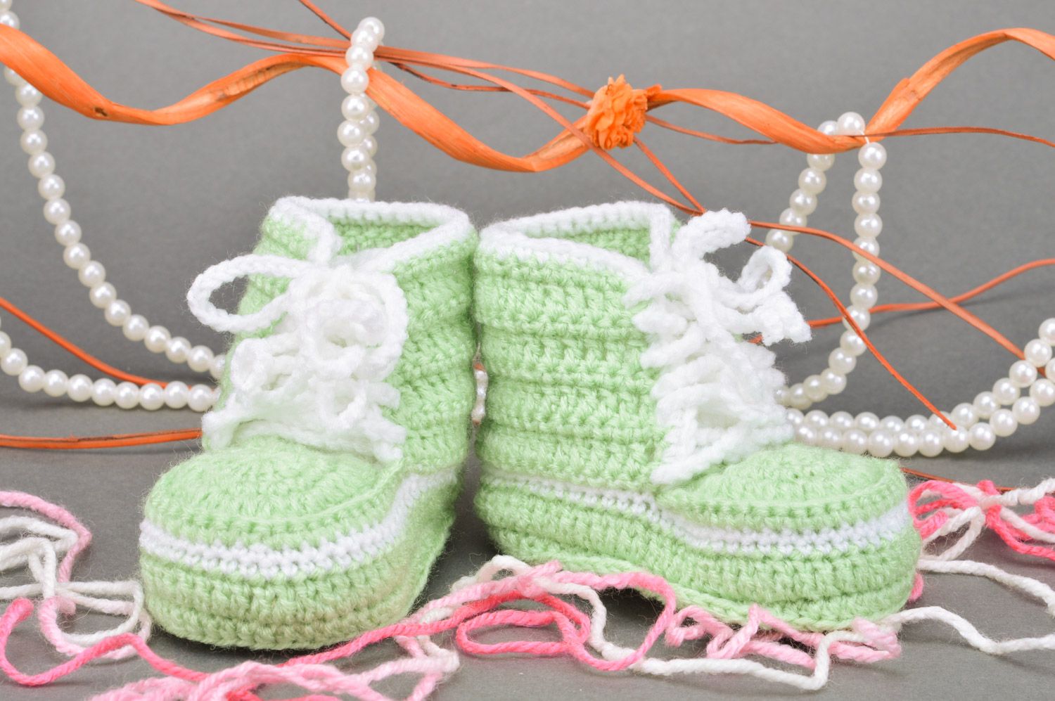 Handmade crocheted lace light green baby booties made of cotton photo 1
