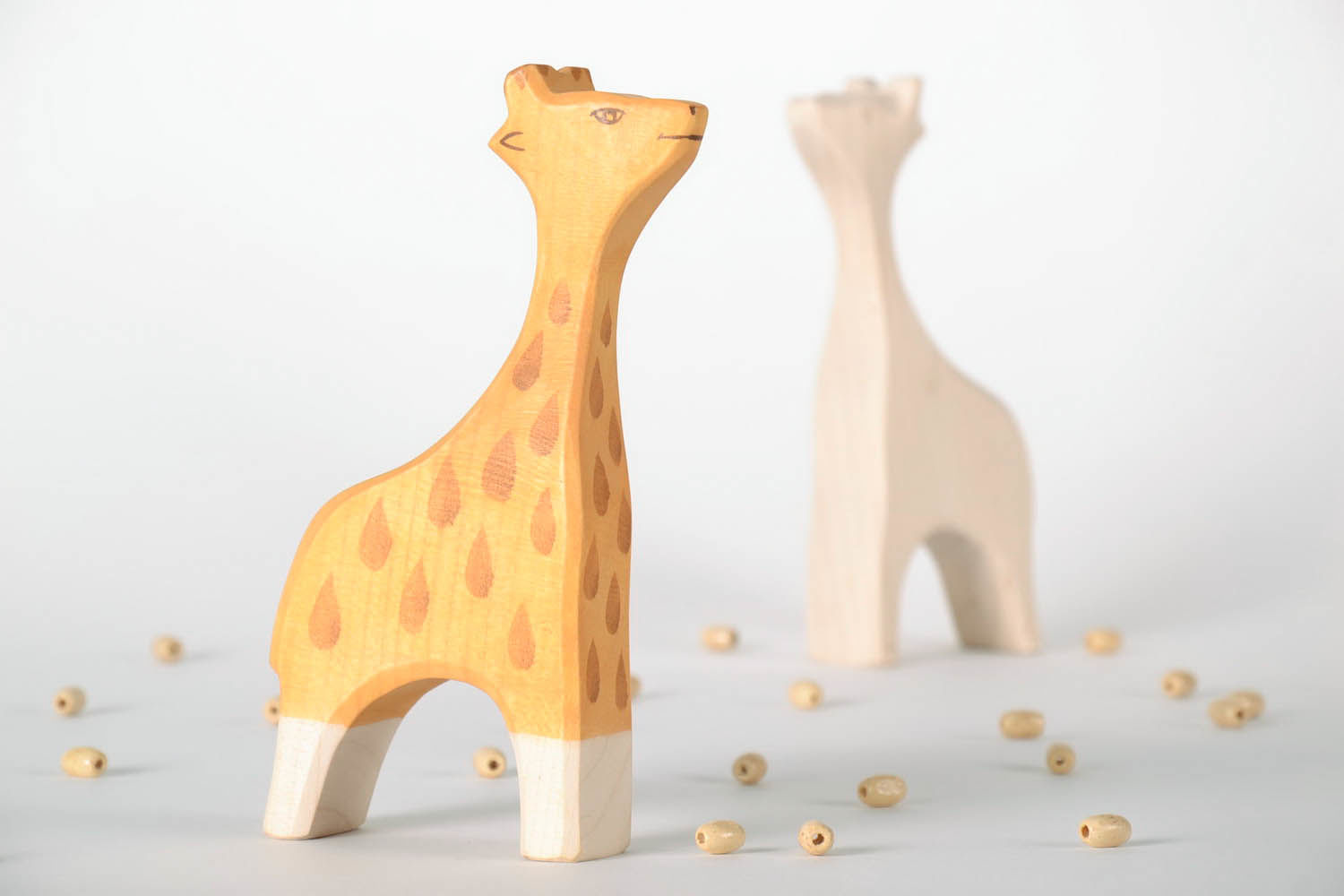 Hölzernes Spielzeug kleine Giraffe foto 2