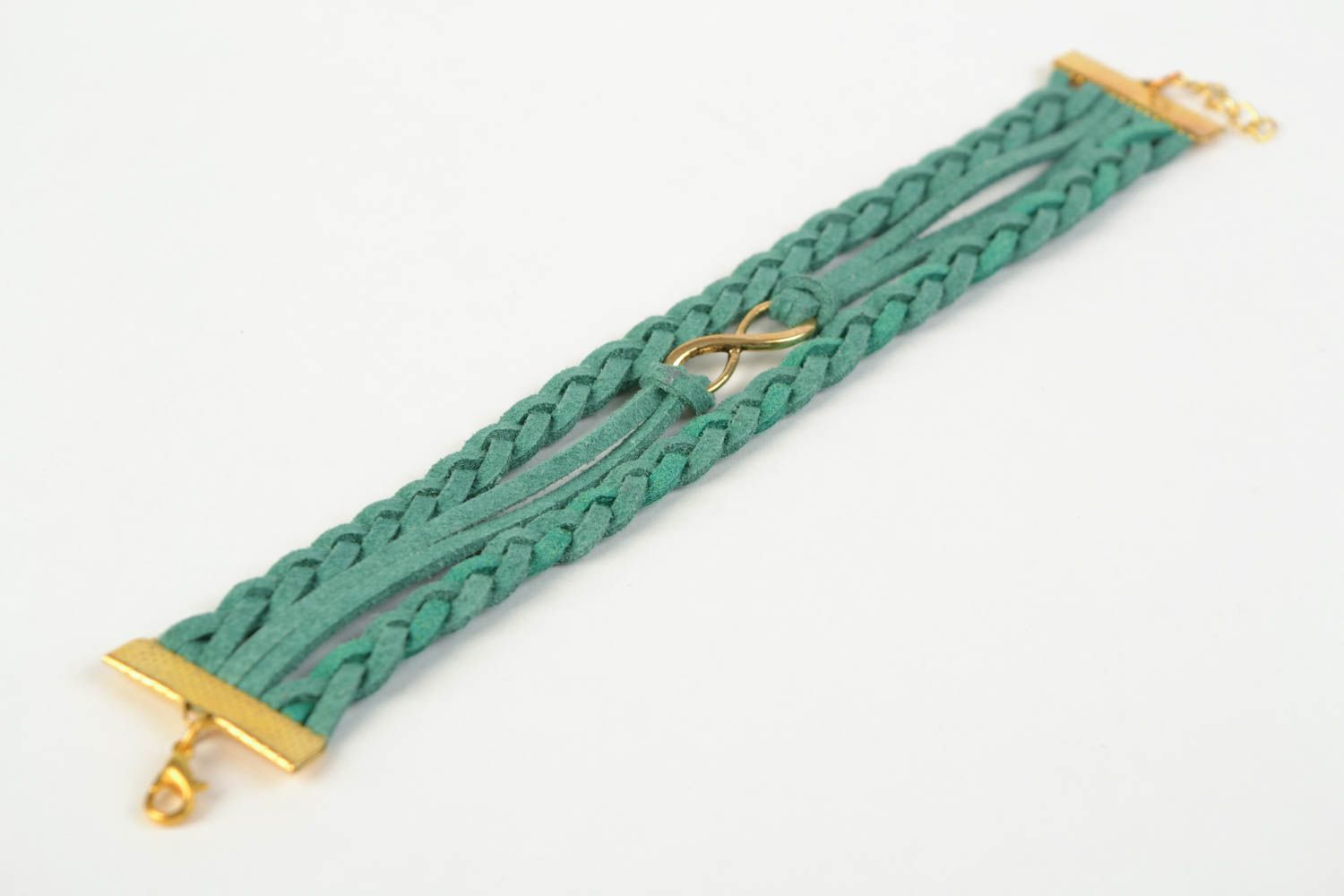 Handmade multi row suede cord woven wrist bracelet of turquoise color with charm photo 5