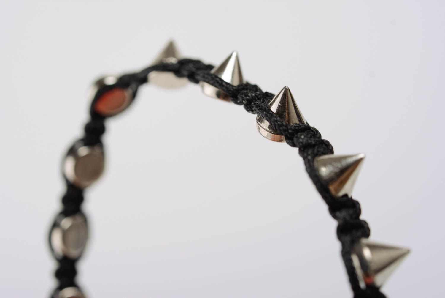 Beautiful black handmade thin macrame woven cord bracelet with metal studs photo 2