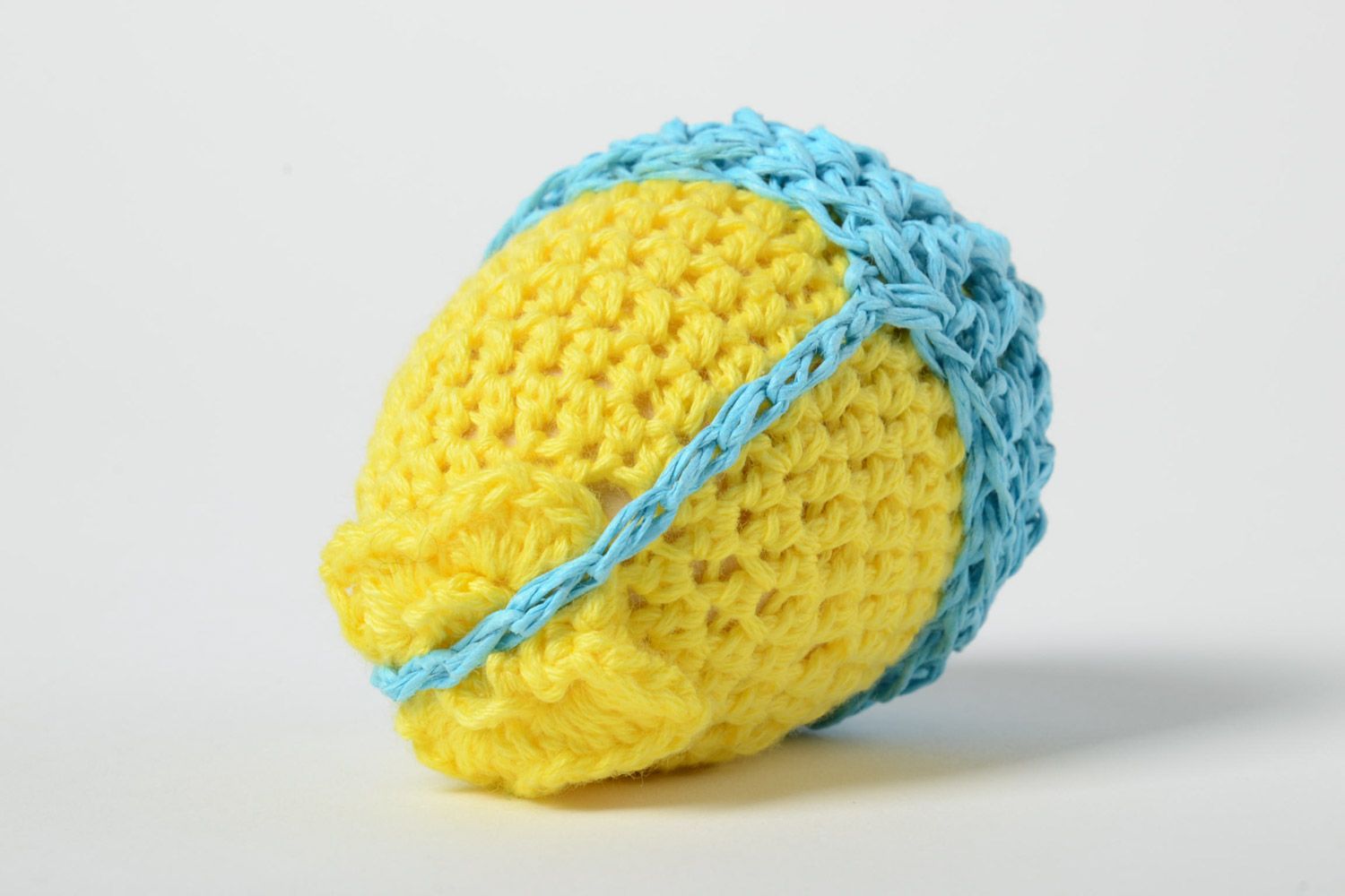 Handmade wooden egg crocheted over with yellow and blue threads Easter decoration photo 3