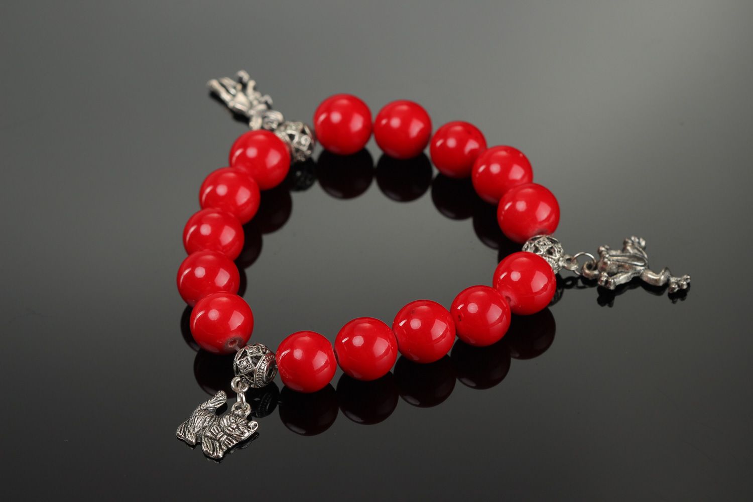 Handmade wrist bracelet with charms and beads of artificial coral for women photo 1