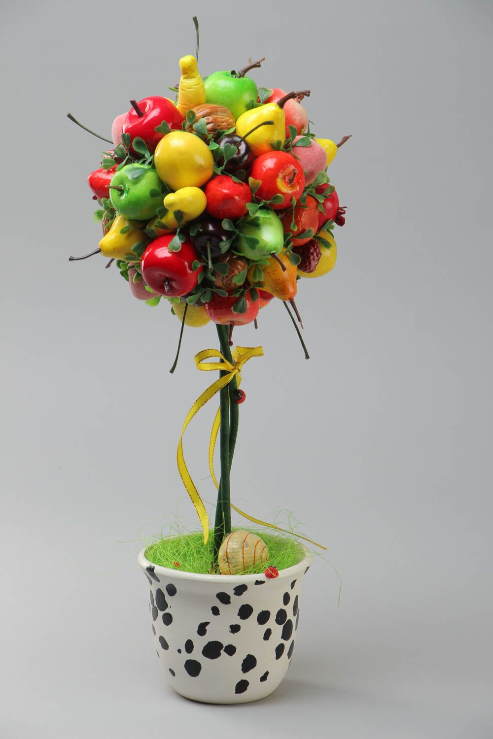 Handcrafted topiary made of artificial fruit in a pot for unique home decor photo 2