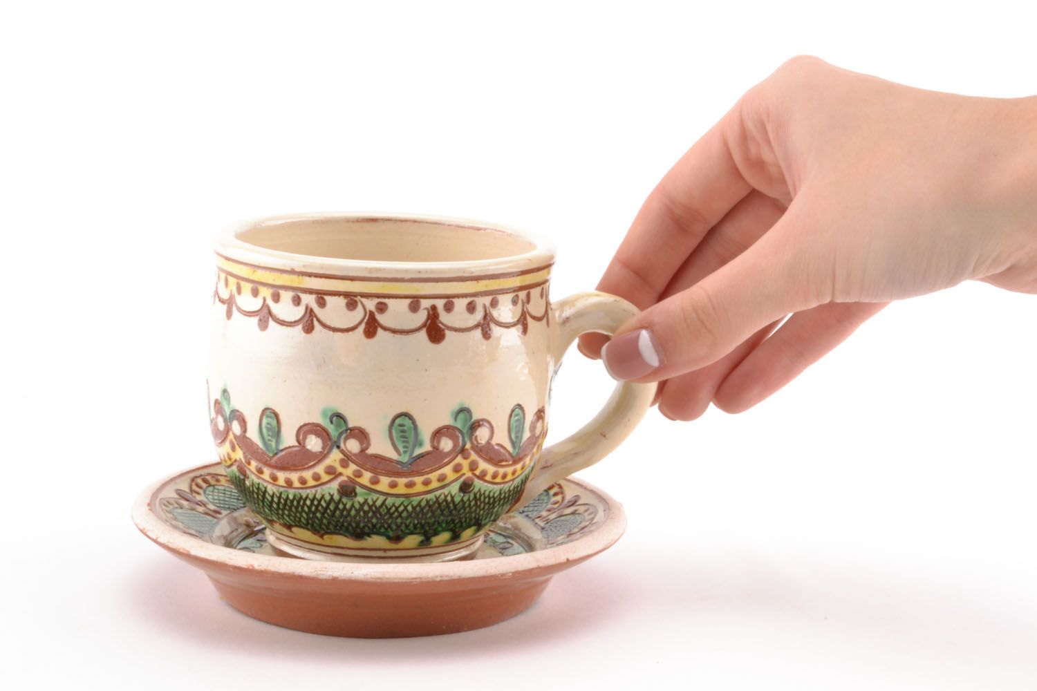 Decorative glazed coffee cup with handle, saucer in Ukrainian green and brown pattern photo 2