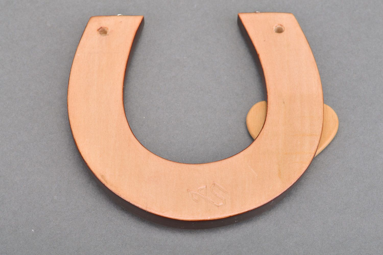 Handmade wooden wall key holder in the form of a horseshoe carved manually photo 5