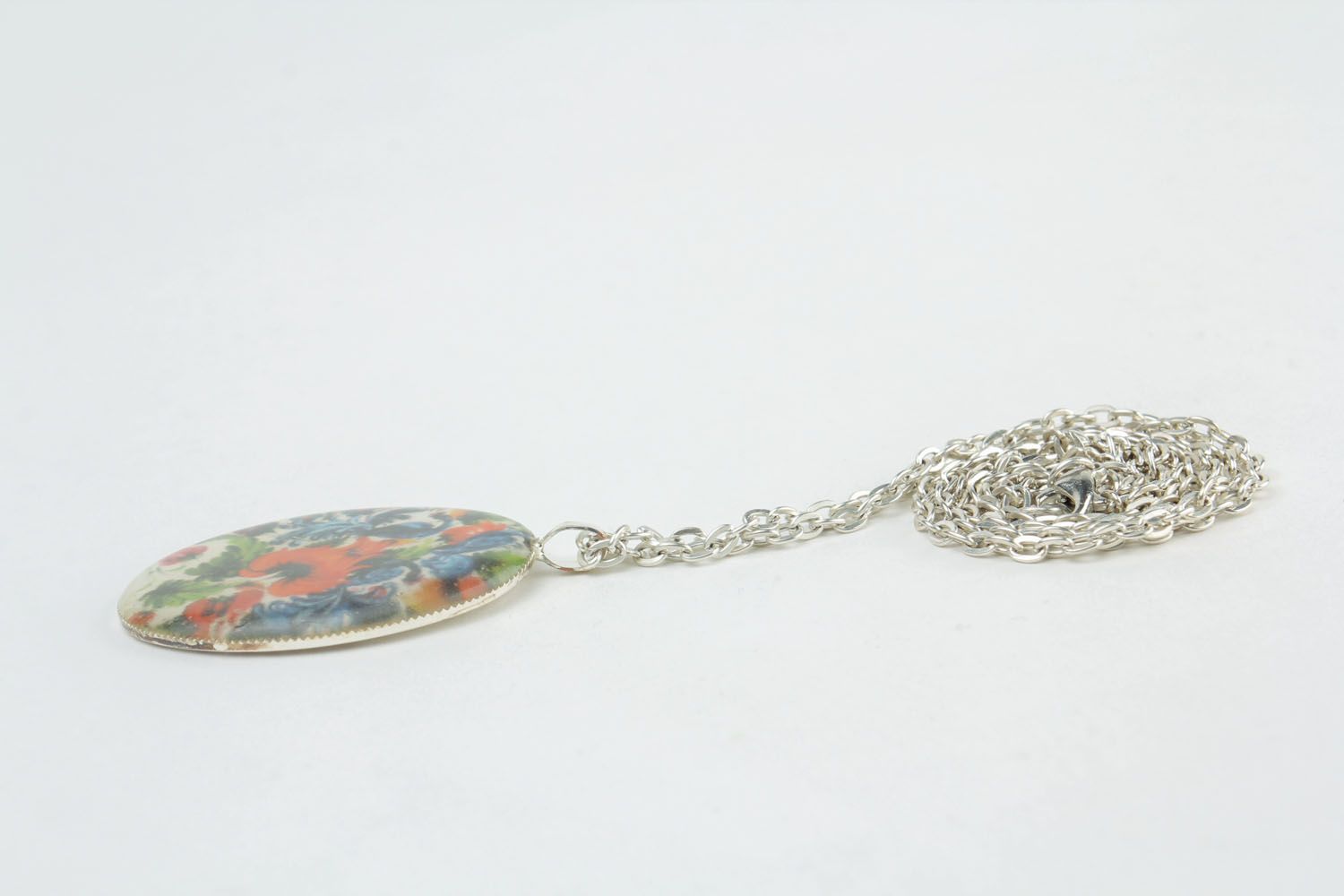 Homemade pendant with Petrikov painting photo 3