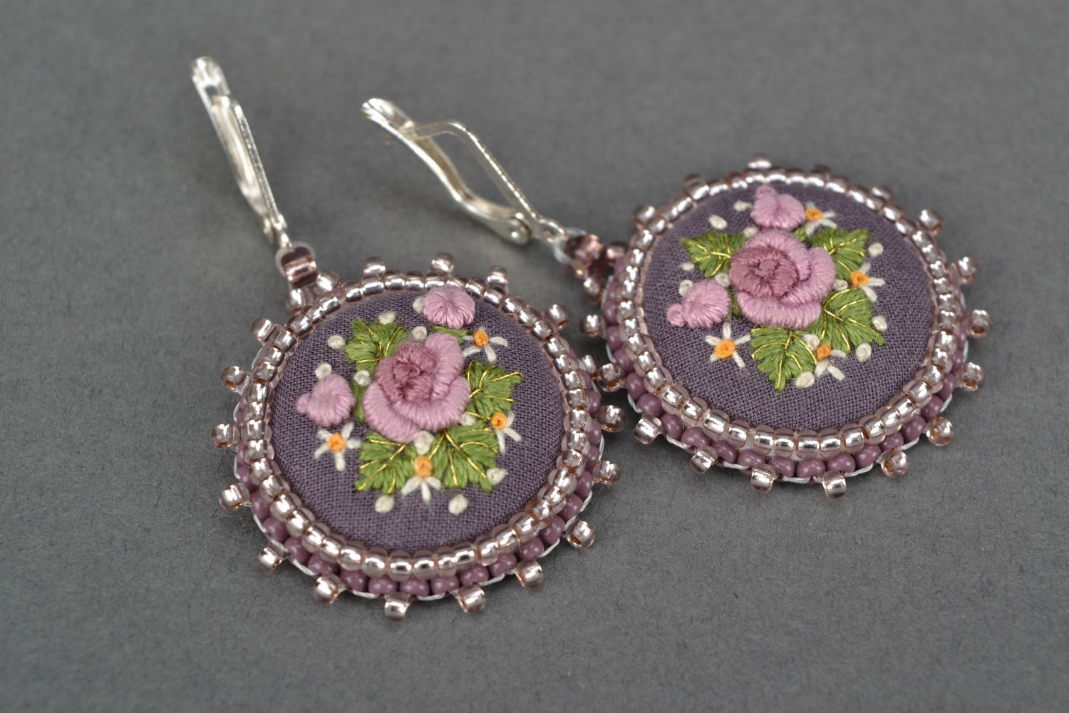 Satin stitch embroidered earrings on leather basis photo 4