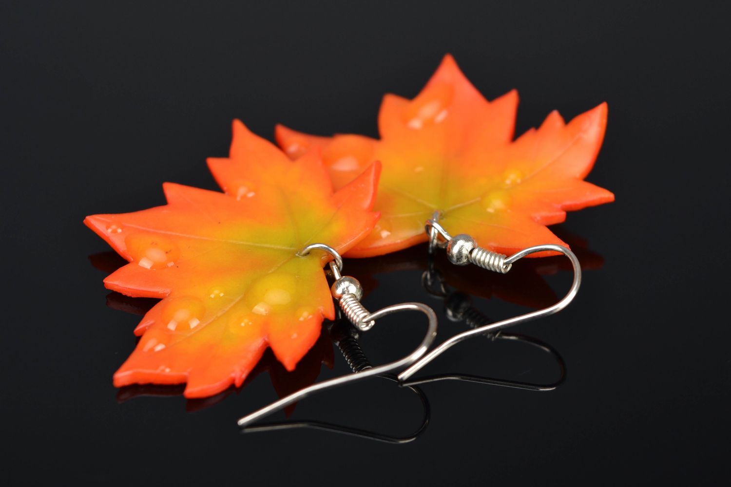 Polymer clay earrings in the shape of leaves photo 1